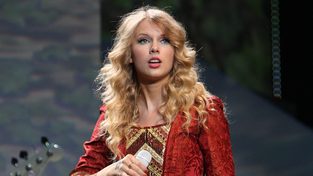 Taylor Swift performing Love Story on-stage