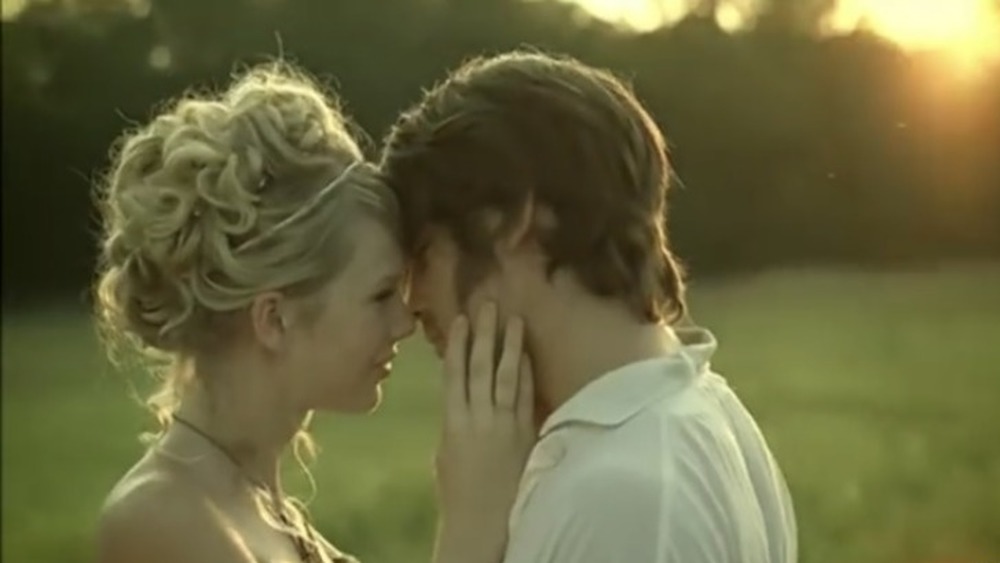 Taylor Swift looks at Justin Gaston in her music video for Love Story