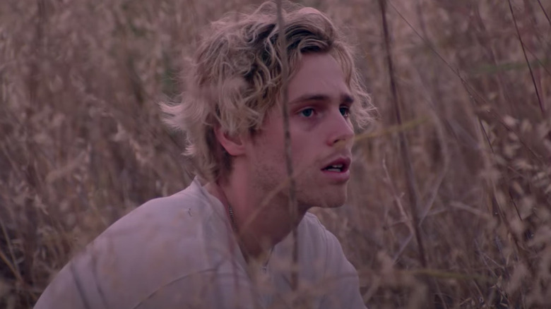 Luke Hemmings in a field 'Starting Line' visualizer