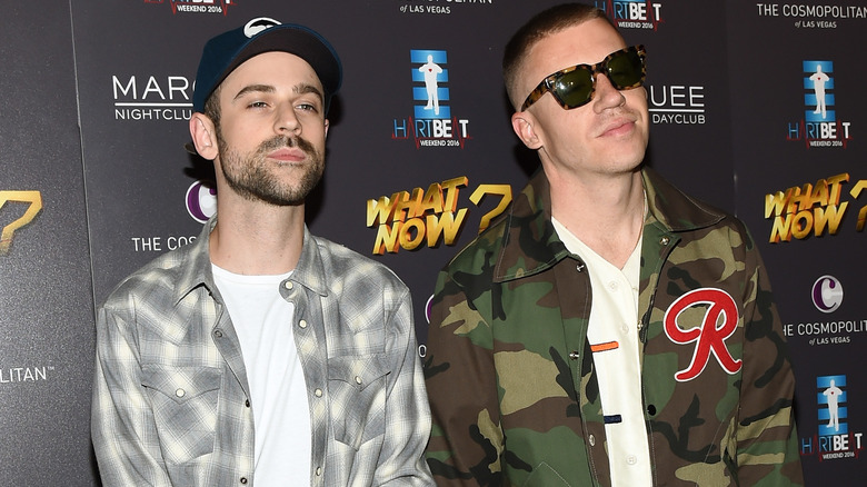 Ryan Lewis and Macklemore pose on the red carpet