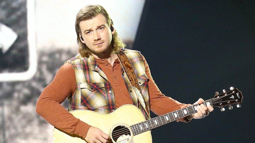 Morgan Wallen performing on stage