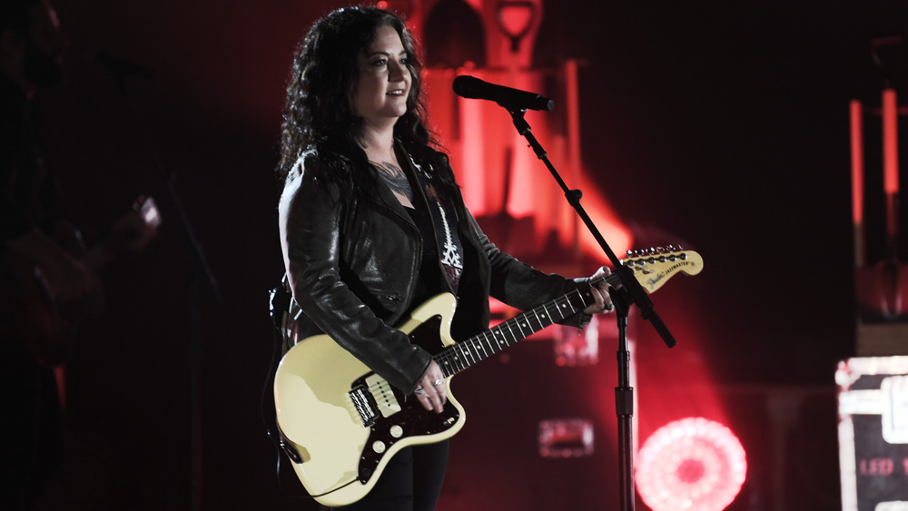 Ashley McBryde performing on stage