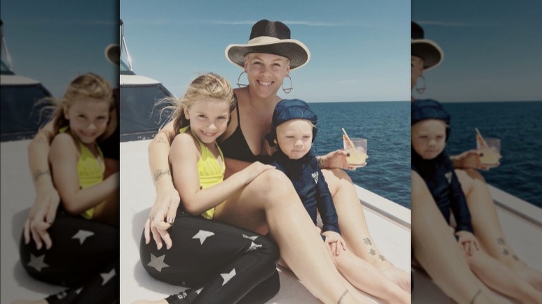 Pink on a boat with her kids