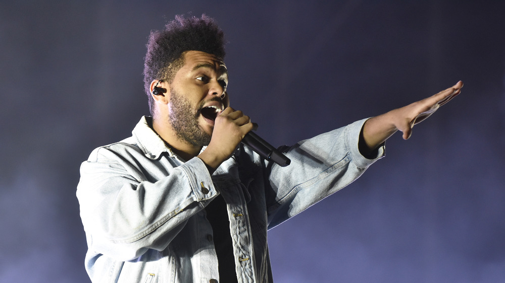 The Weeknd performing