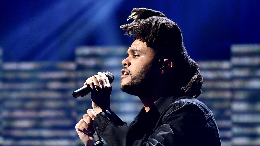 The Weeknd performing at a concert