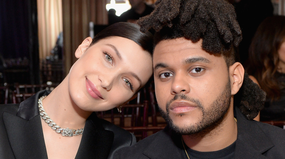 Bella Hadid, The Weeknd, posing