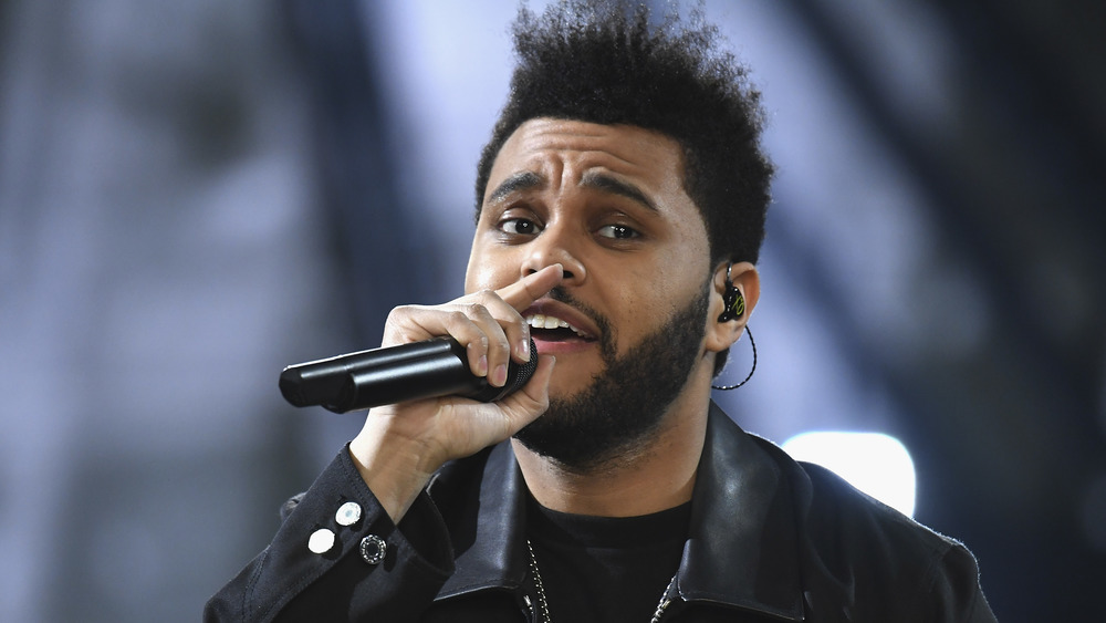 The Weeknd performing on stage 