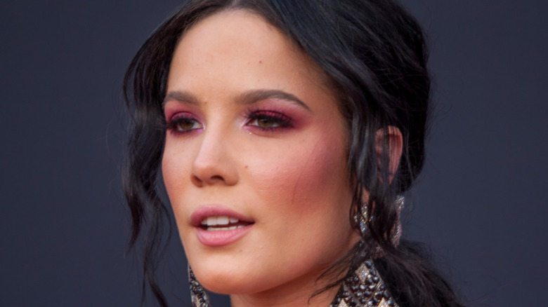 Halsey wearing earrings