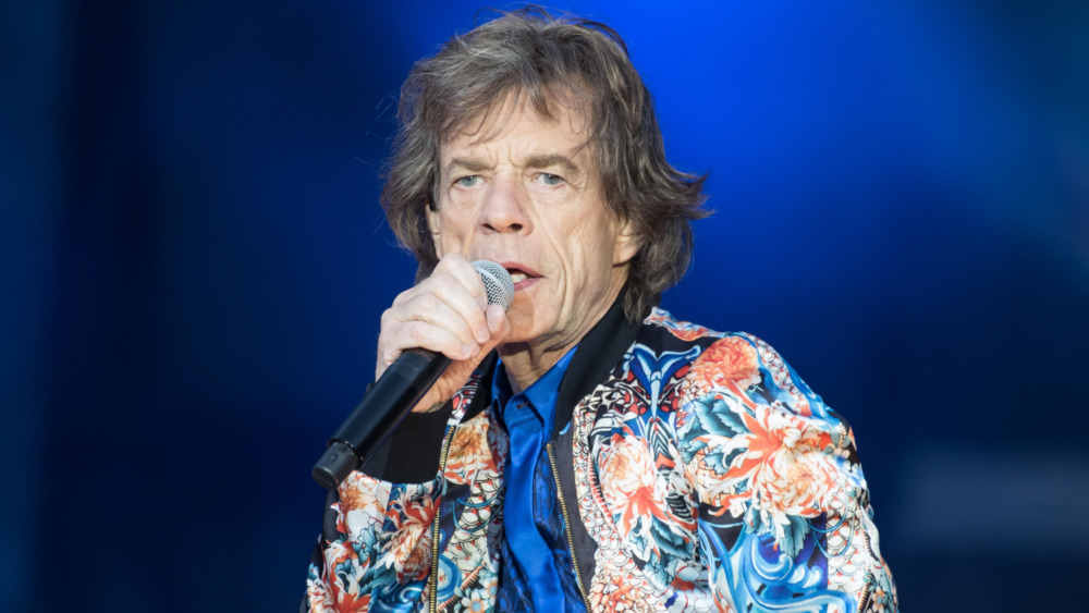 Mick Jagger performs on stage