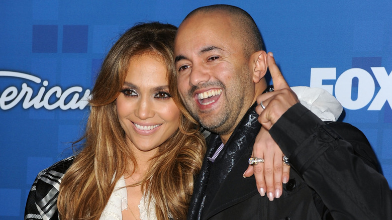 Jennifer Lopez and RedOne smiling