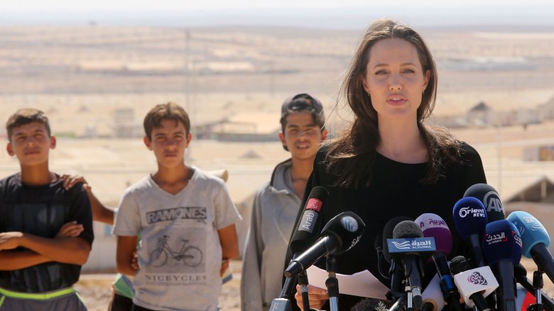 Angelina Jolie speaking during a field mission