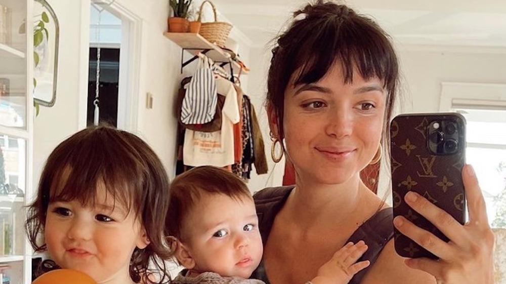 Bekah Martinez posing with her children in an Instagram selfie