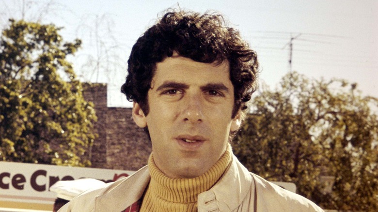 Elliott Gould posing outside