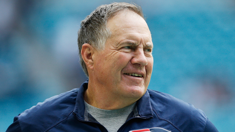 Bill Belichick smiling on the sidelines