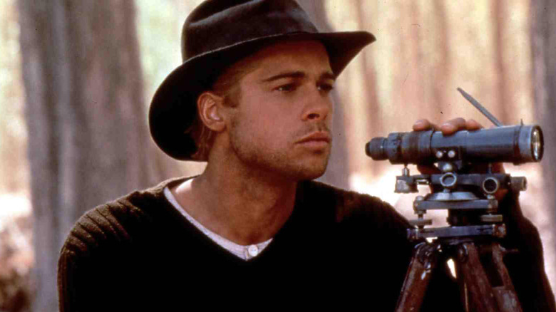 Brad Pitt as mountain climber Henrich Harrer looking through binoculars in "Seven Years in Tibet"