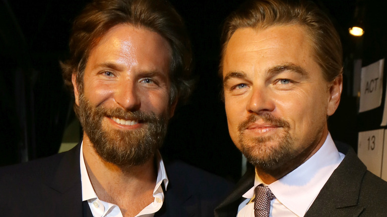 Bradley Cooper and Leonardo DiCaprio smiling