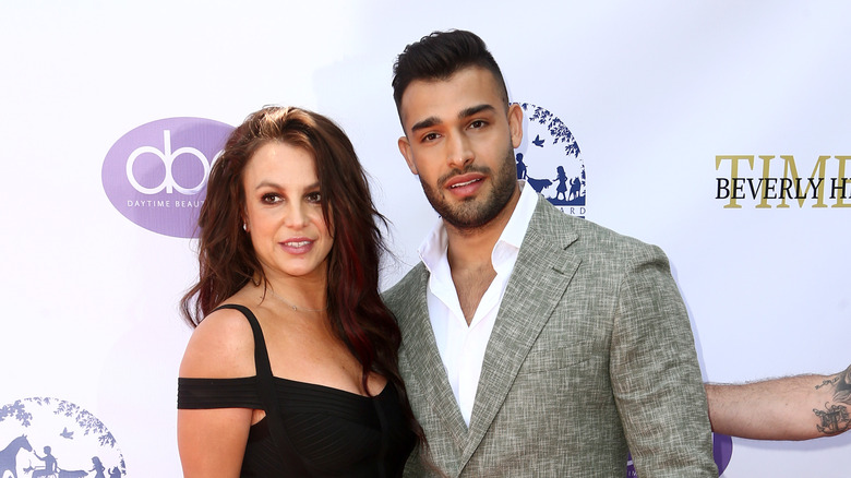 Britney Spears and Sam Asghari pose 