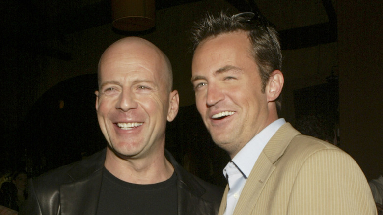 Bruce Willis and Matthew Perry laugh 