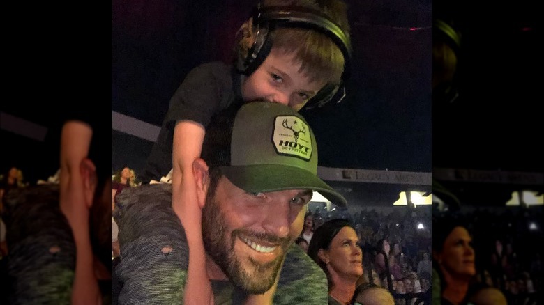 Mike Fisher with Isaiah Fisher on his shoulders