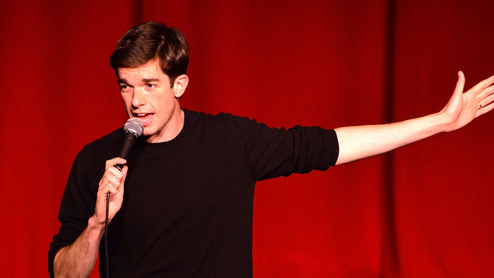 John Mulaney performing standup