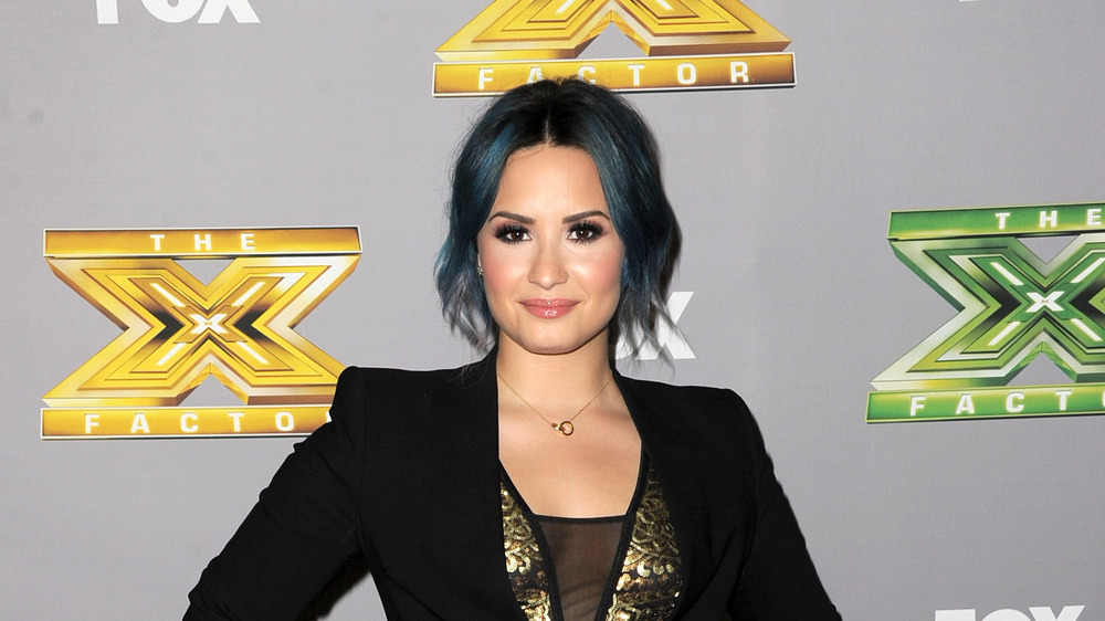 Demi Lovato poses for The X Factor