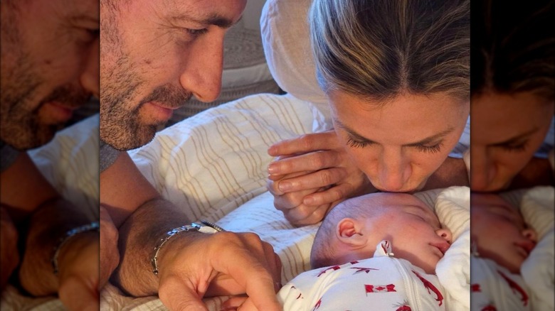 Jarret Stoll, Erin Andrews posing with baby 