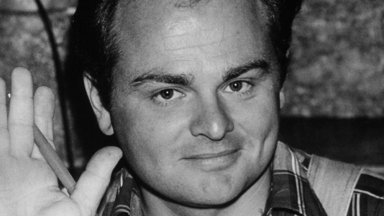 Gary Burghoff smiles and waves in close-up