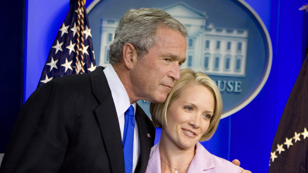 George W. Bush with then-press secretary Dana Perino