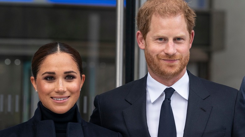 Prince Harry and Meghan Markle posing