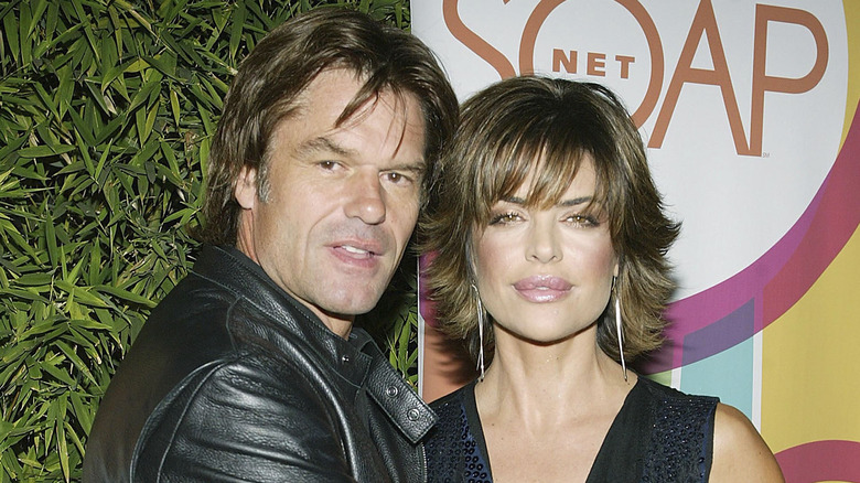 Harry Hamlin Lisa Rinna embrace party 