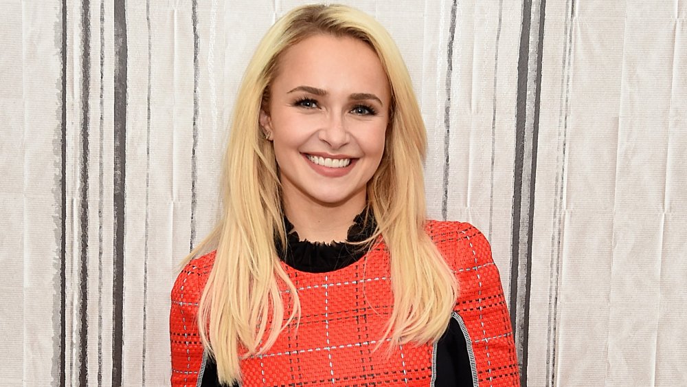 Hayden Panettiere smiling while staring straight at the camera