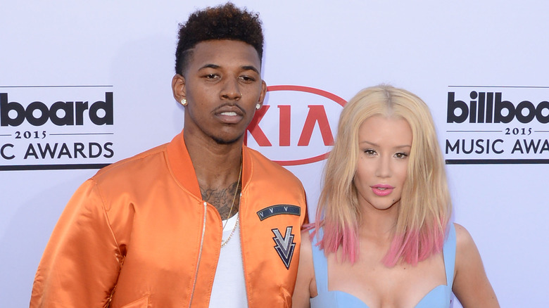 Nick Young, Iggy Azalea, 2015 Billboard Awards red carpet, neither smiling