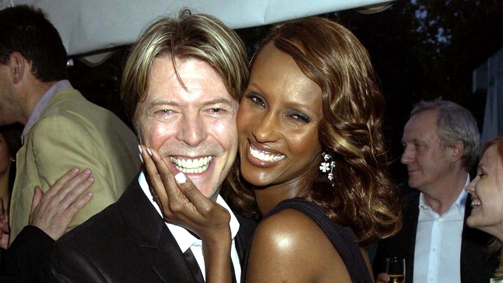 David Bowie and Iman smiling for the camera