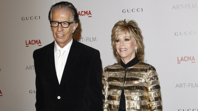 Jane Fonda and Richard Perry smiling on the red carpet