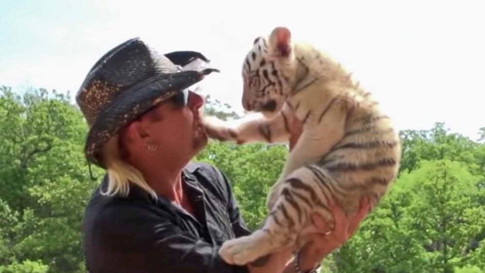 Joe Exotic holding Tiger