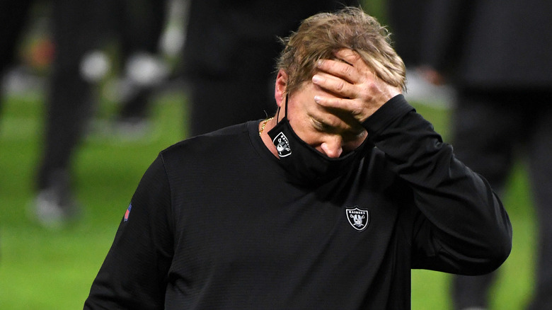 on Gruden of the Las Vegas Raiders walking off the field after his team's loss