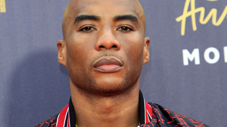 Charlamagne Tha God posing at an event