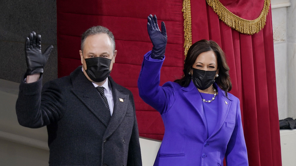 Kamala Harris and husband Doug Emhoff waving