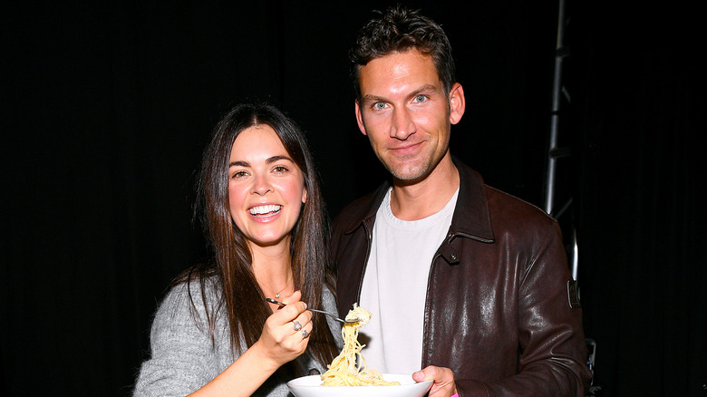 Katie Biegel sharing pasta with husband