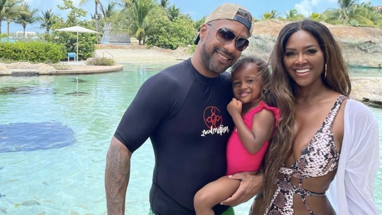 Kenya Moore with her ex-husband Marc Daly and daughter Brooklyn