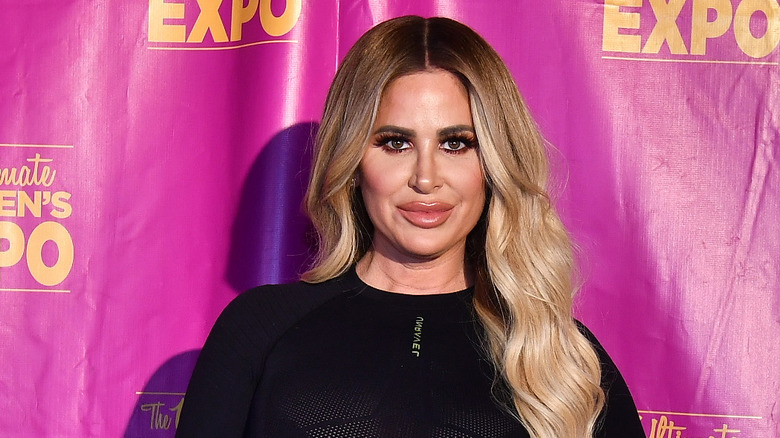 Kim Zolciak looking into the camera