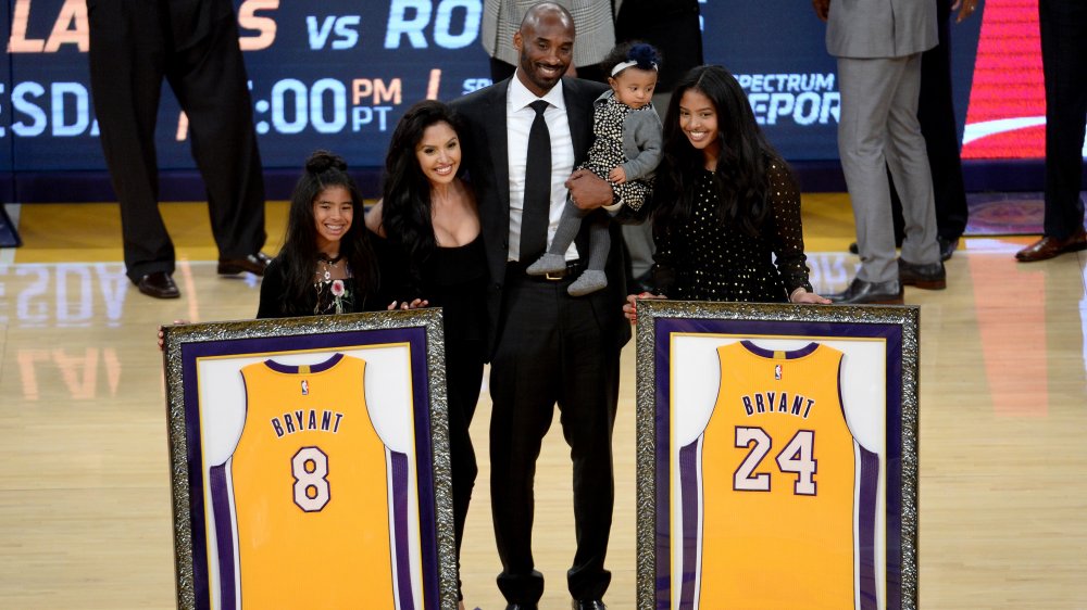 Kobe Bryant retires jerseys No. 8 and No. 24 alongside family