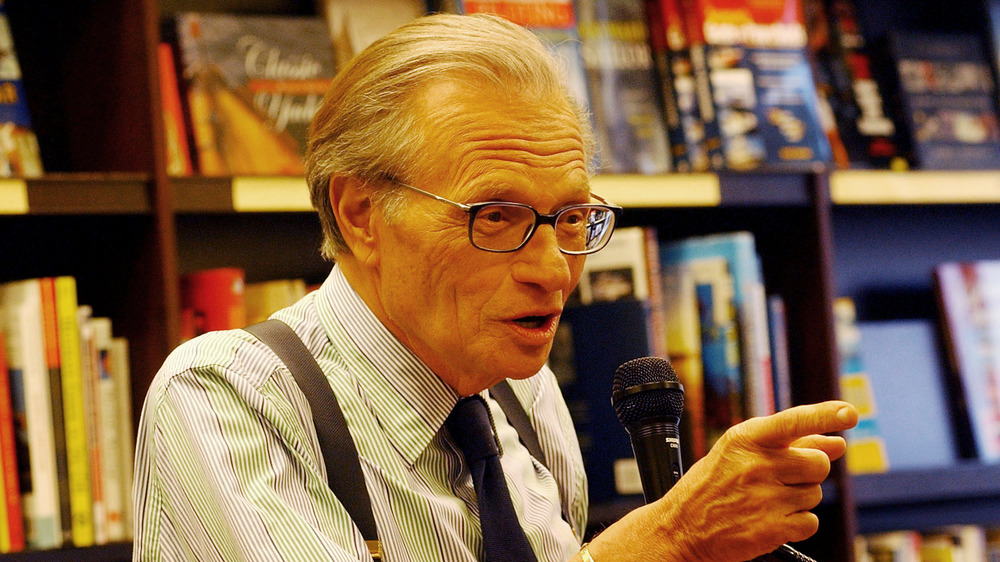 Larry King answers questions at a bookstore