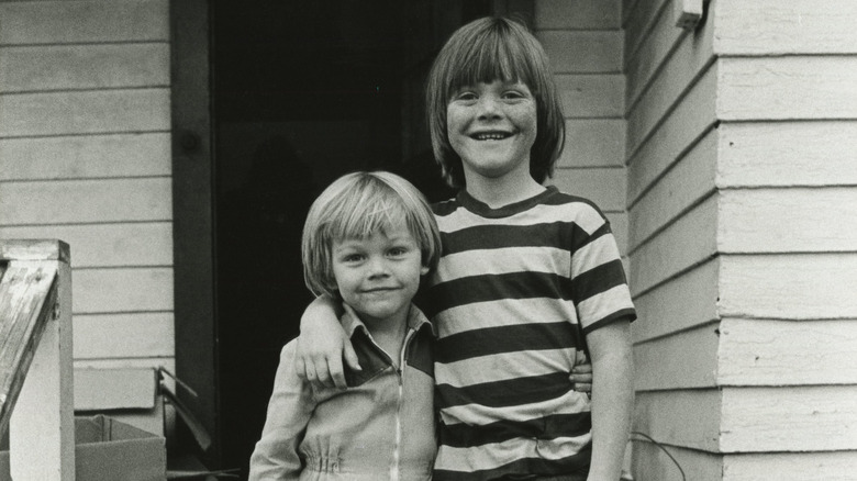 Leonardo DiCaprio as a child with his step-brother.