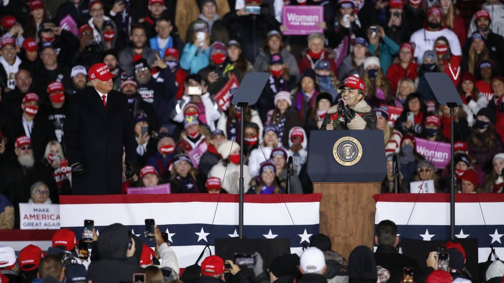 Donald Trump watching Lil Pump speak at a MAGA rally