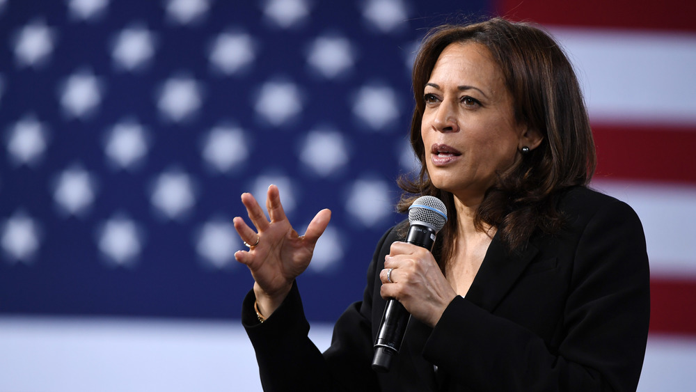 Kamala Harris in front of American flag