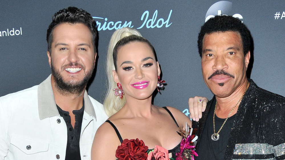 Luke Bryan, Katy Perry, and Lionel Richie posing for American Idol