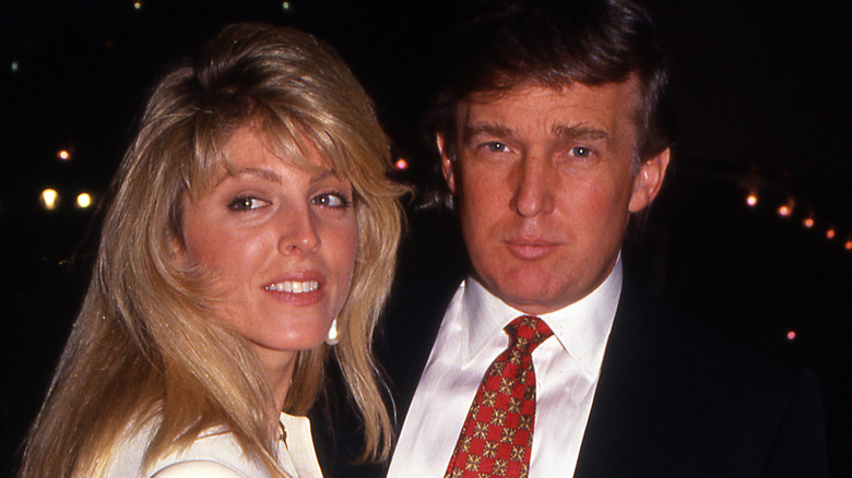 Marla Maples and Donald Trump posing