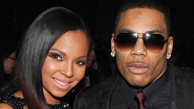 Ashanti and Nelly posing together