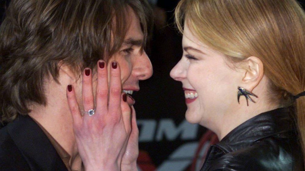 Nicole Kidman touching Tom Cruise's face